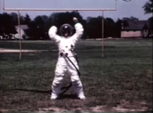 nasa_3 NASA EVA suit tester does toe touches on the gridiron